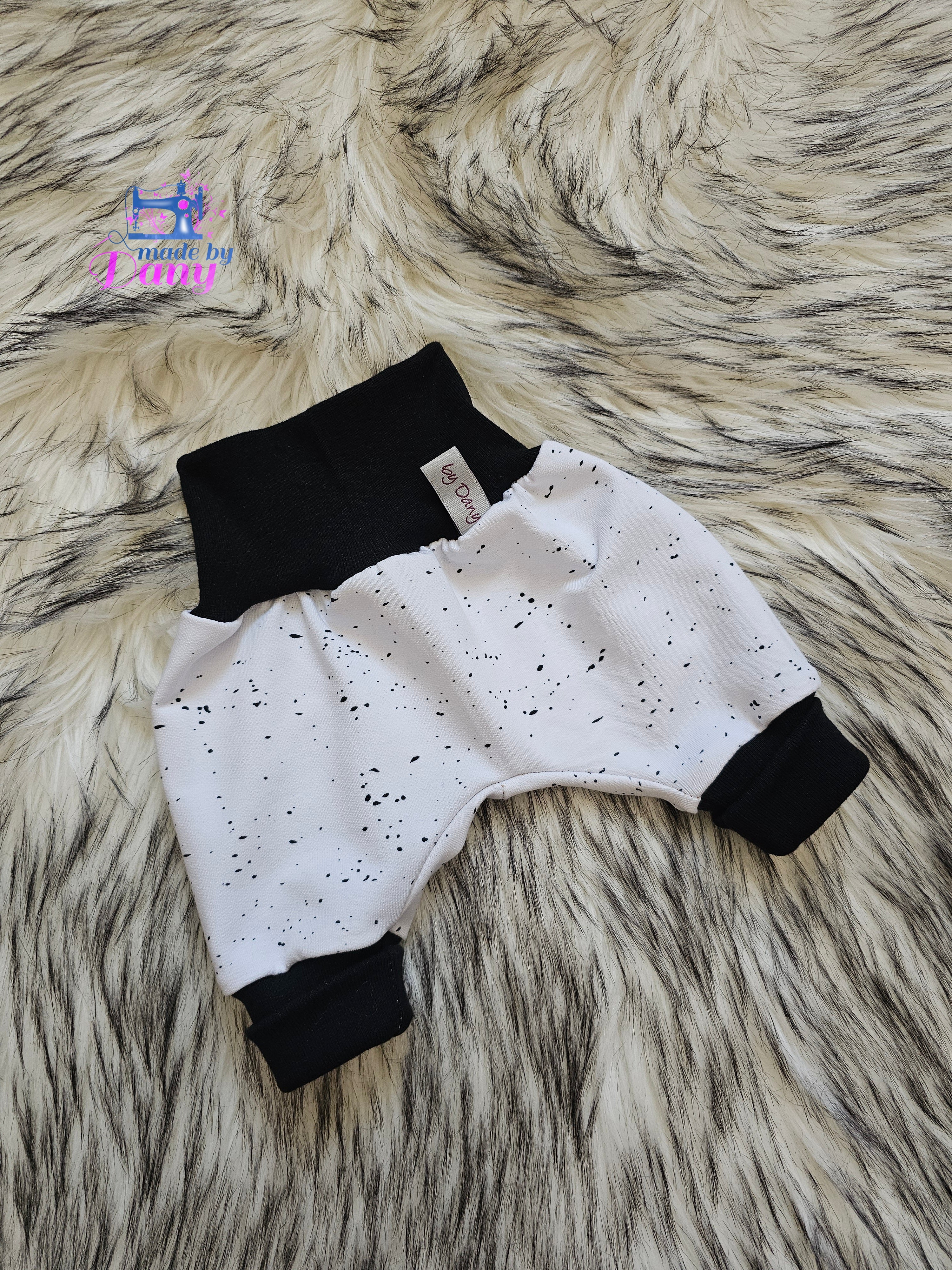 Pumphosen lang schwarze flecken auf weiss 44