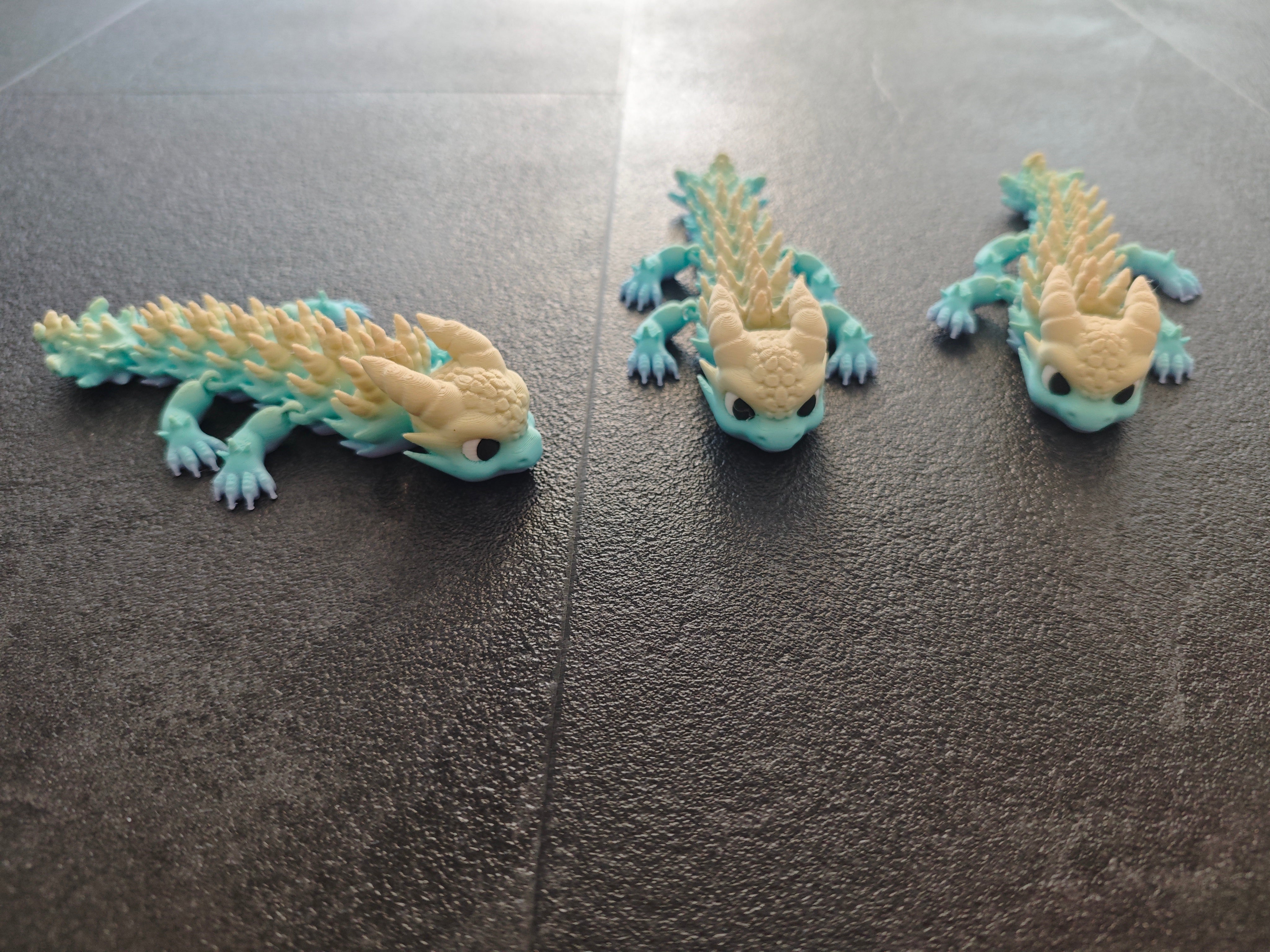 Borstendrache violett mint gelb