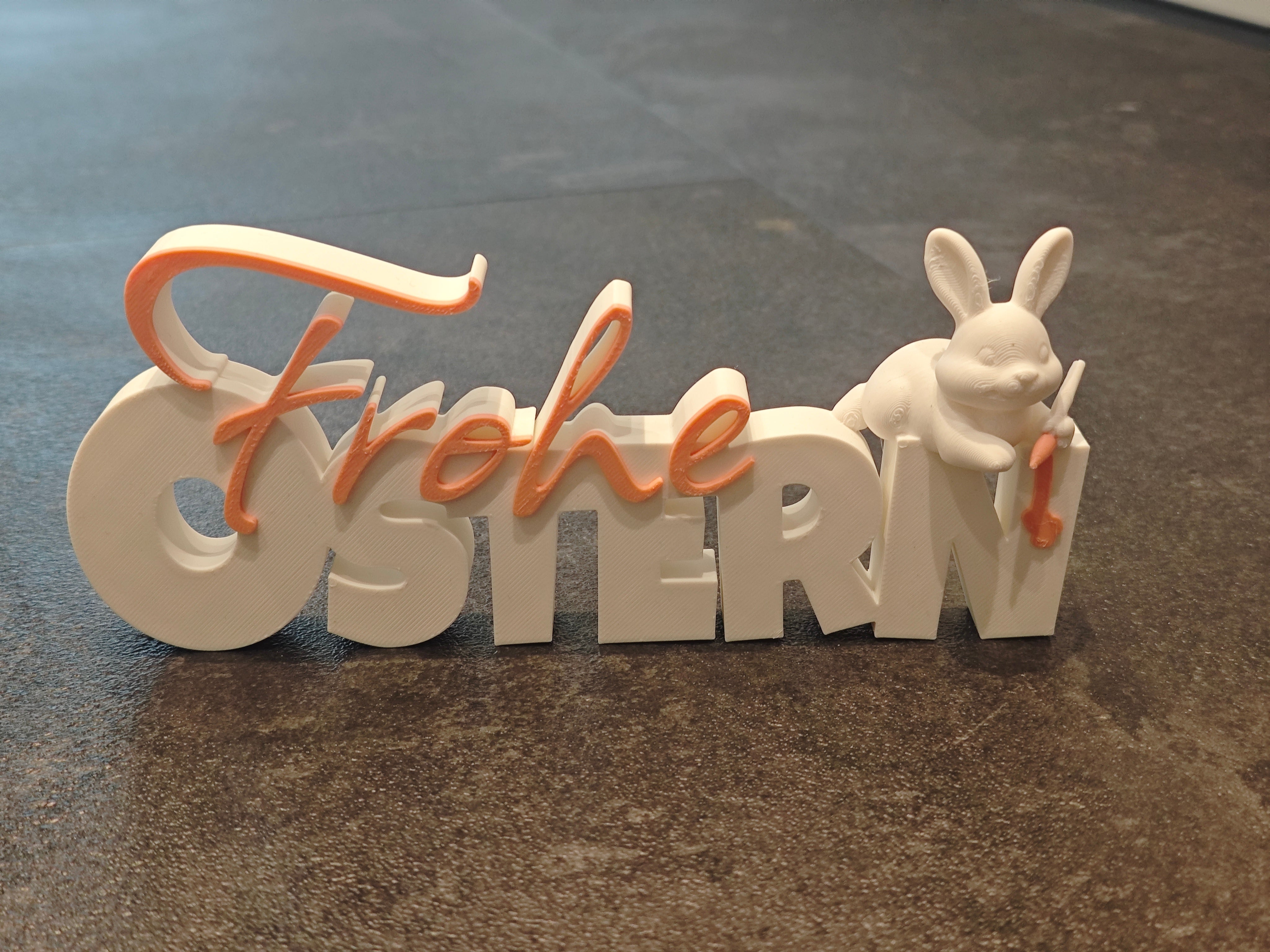 Schrift Frohe Ostern mit Hase weiss, lachs rosa