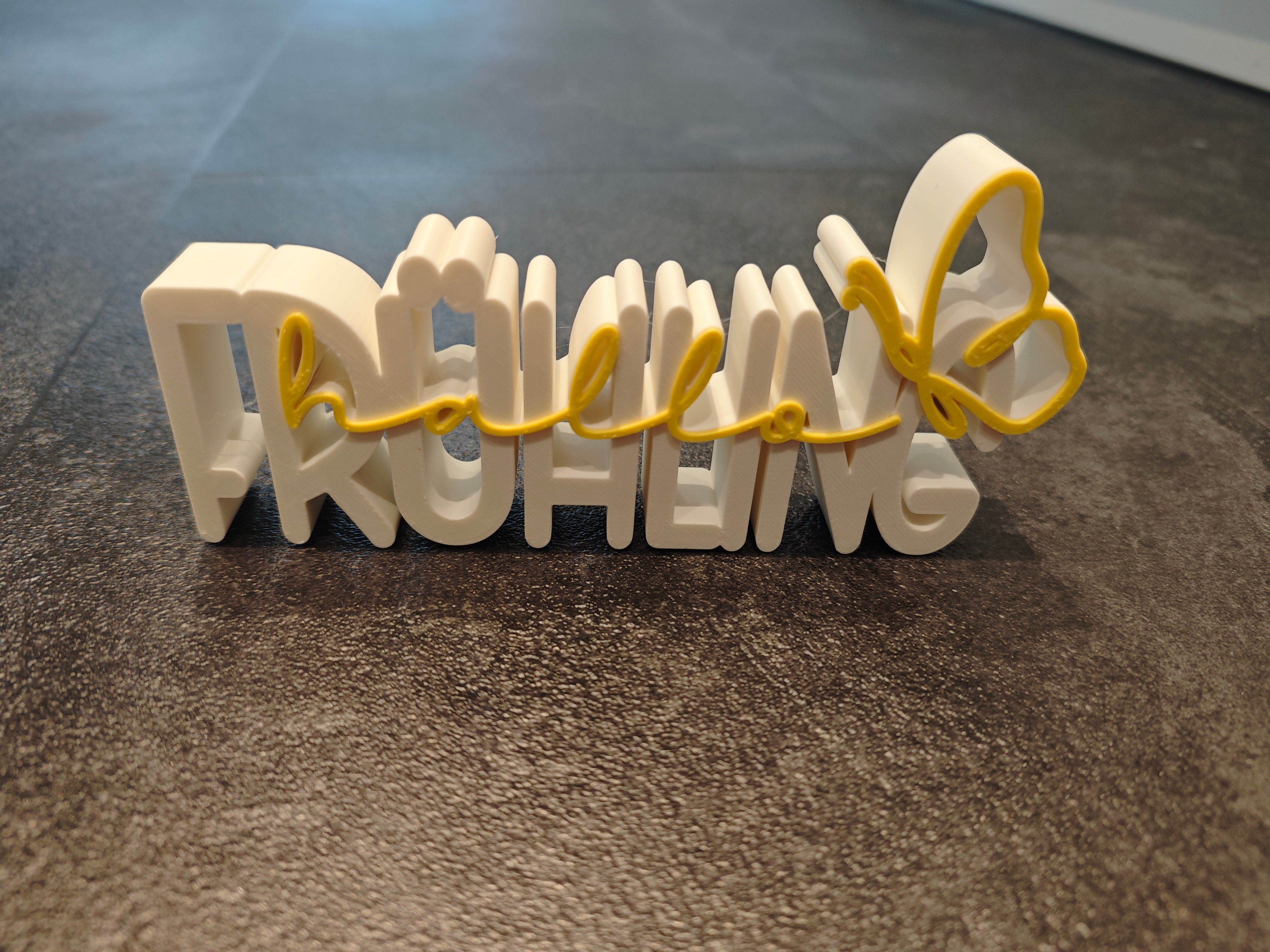 Schrift Hallo Frühling weiss, gelb