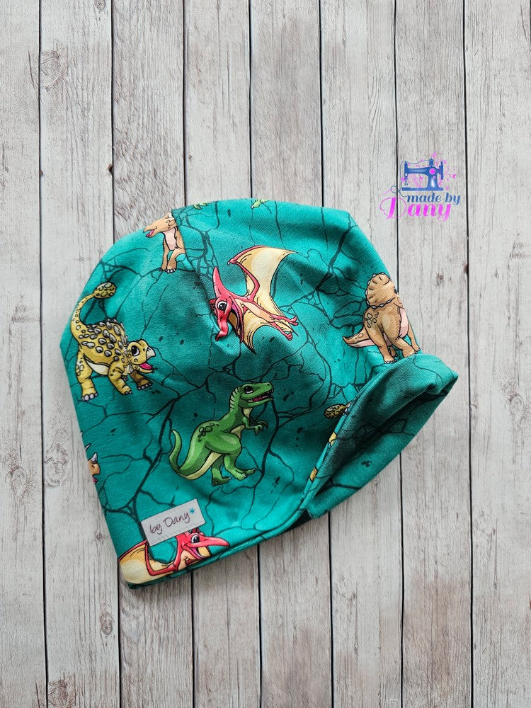 Wendebeanie Dinos auf hellpetrol ca. 49-51 cm