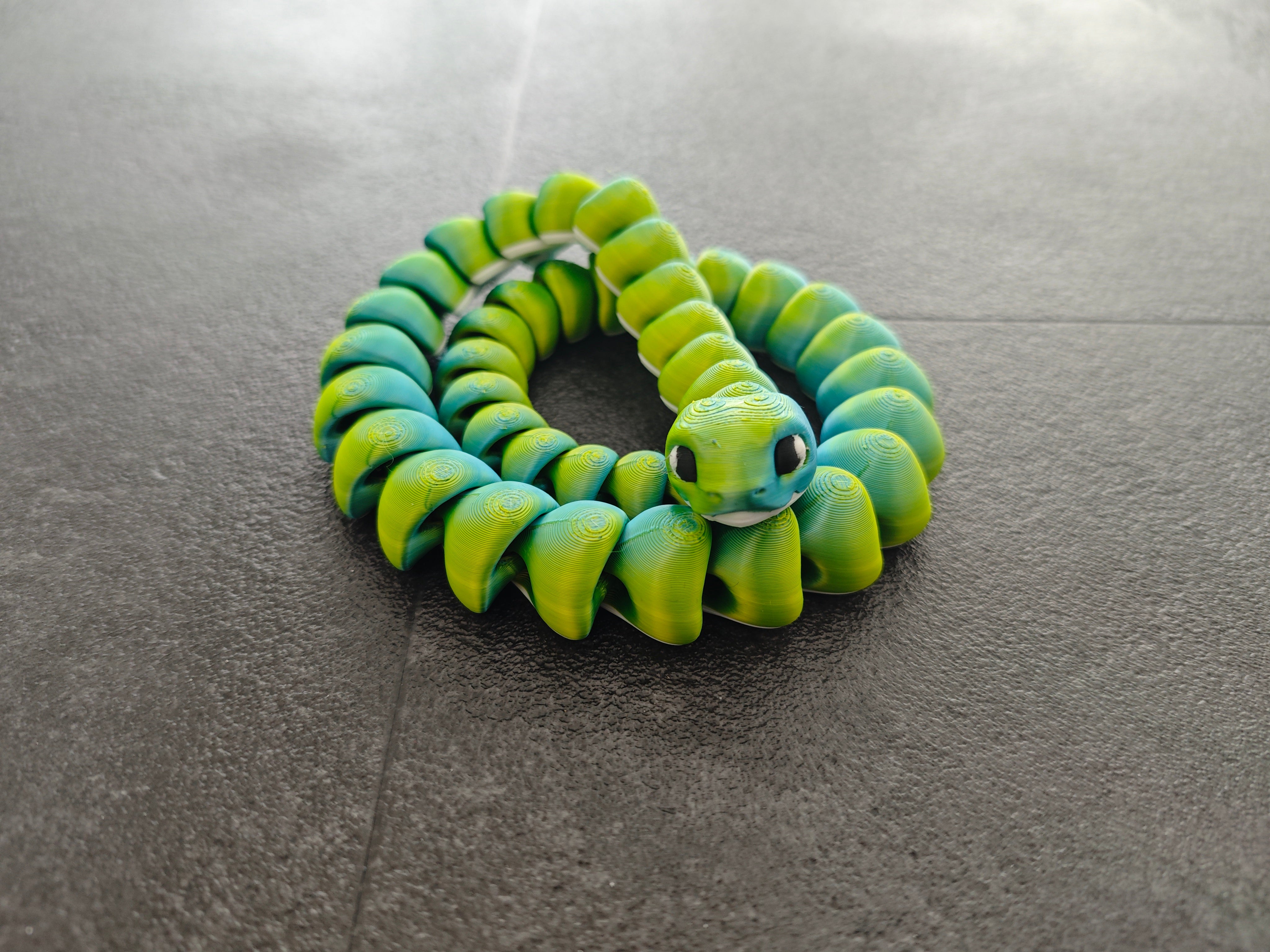 Schlange grün blau weiss