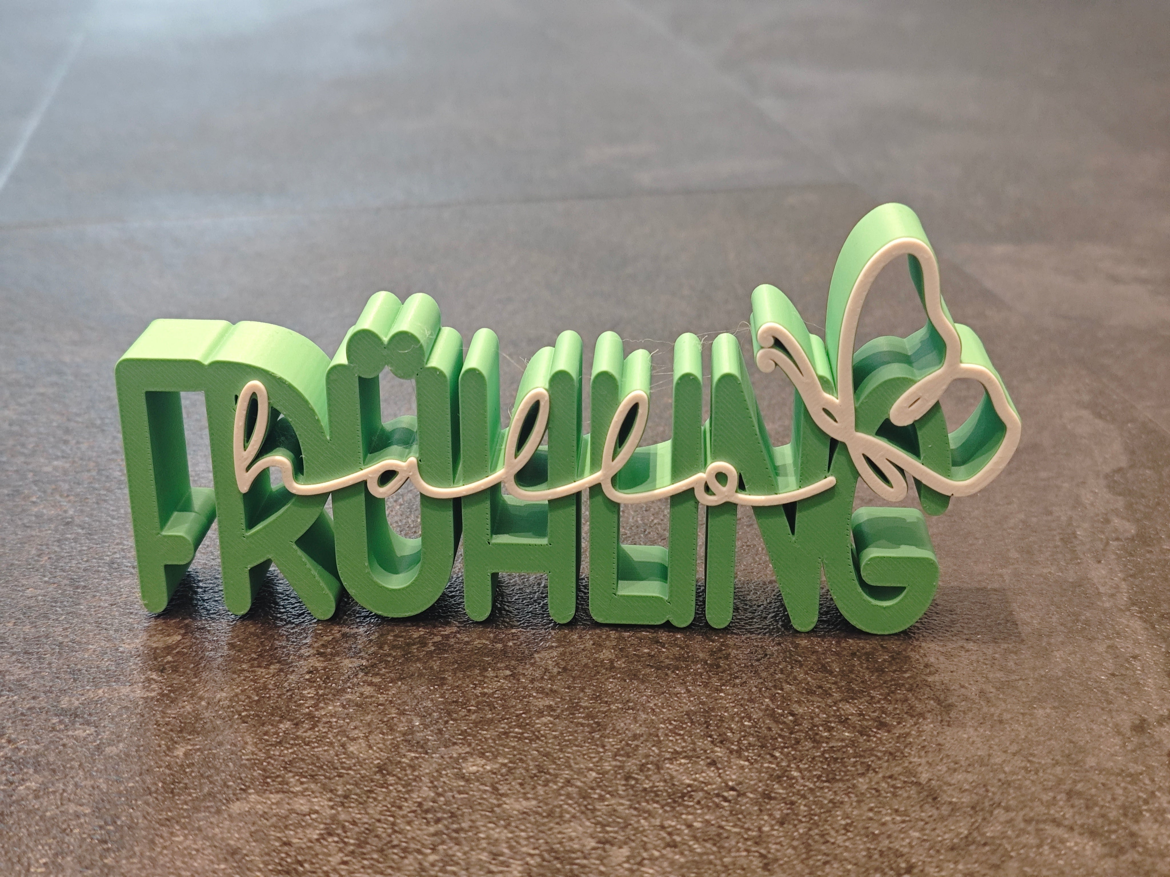 Schrift Hallo Frühling grün, weiss